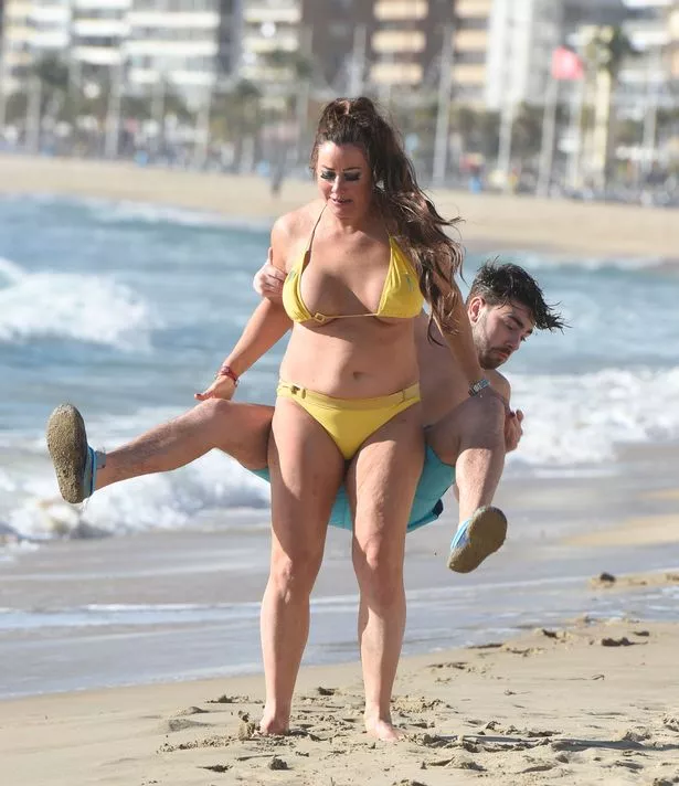 darryl hynes add boobs fall out of bikini photo