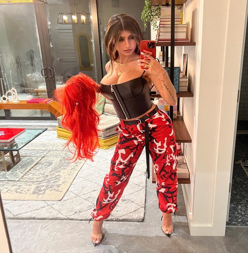 amy wood dowell recommends mia khalifa red dress pic
