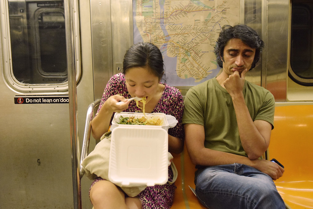 Best of Man eating woman on subway