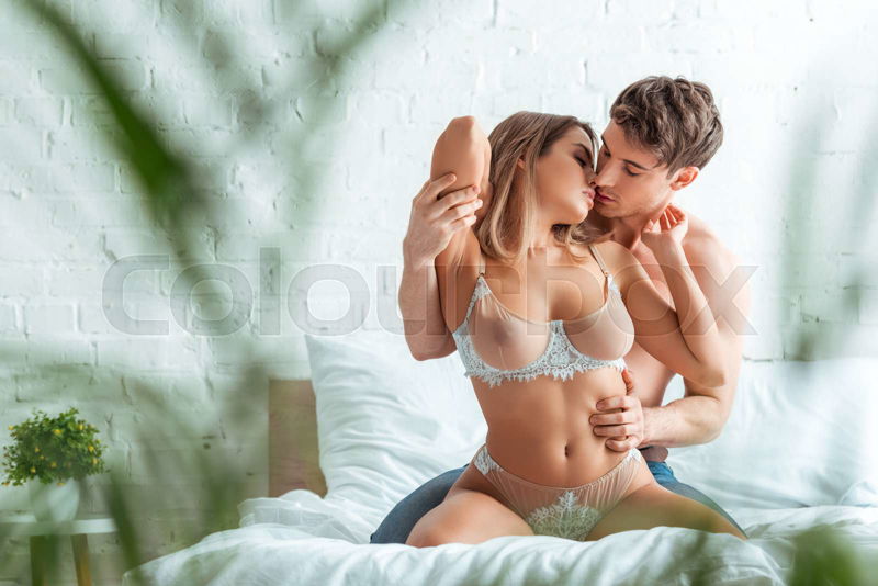 darlena white add men kissing women breast photo