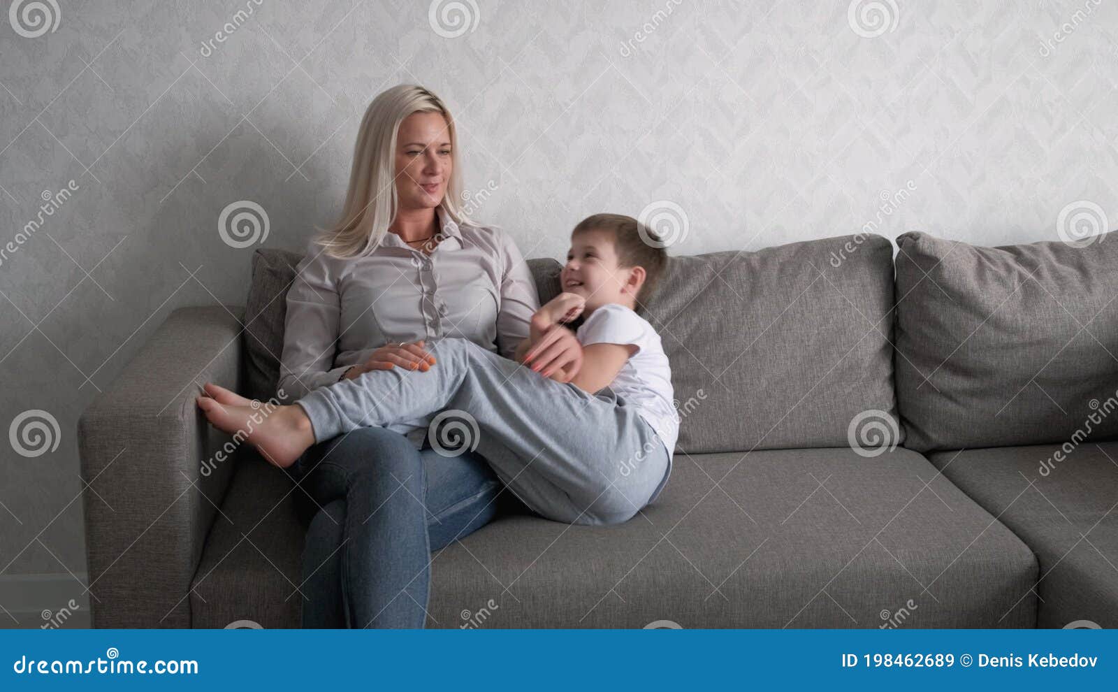 ange wang add photo mom and son on couch