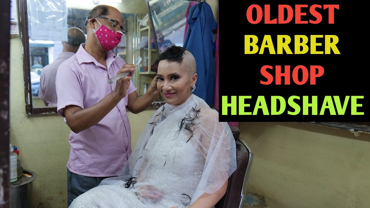 brittiany williams add woman headshave in barbershop photo